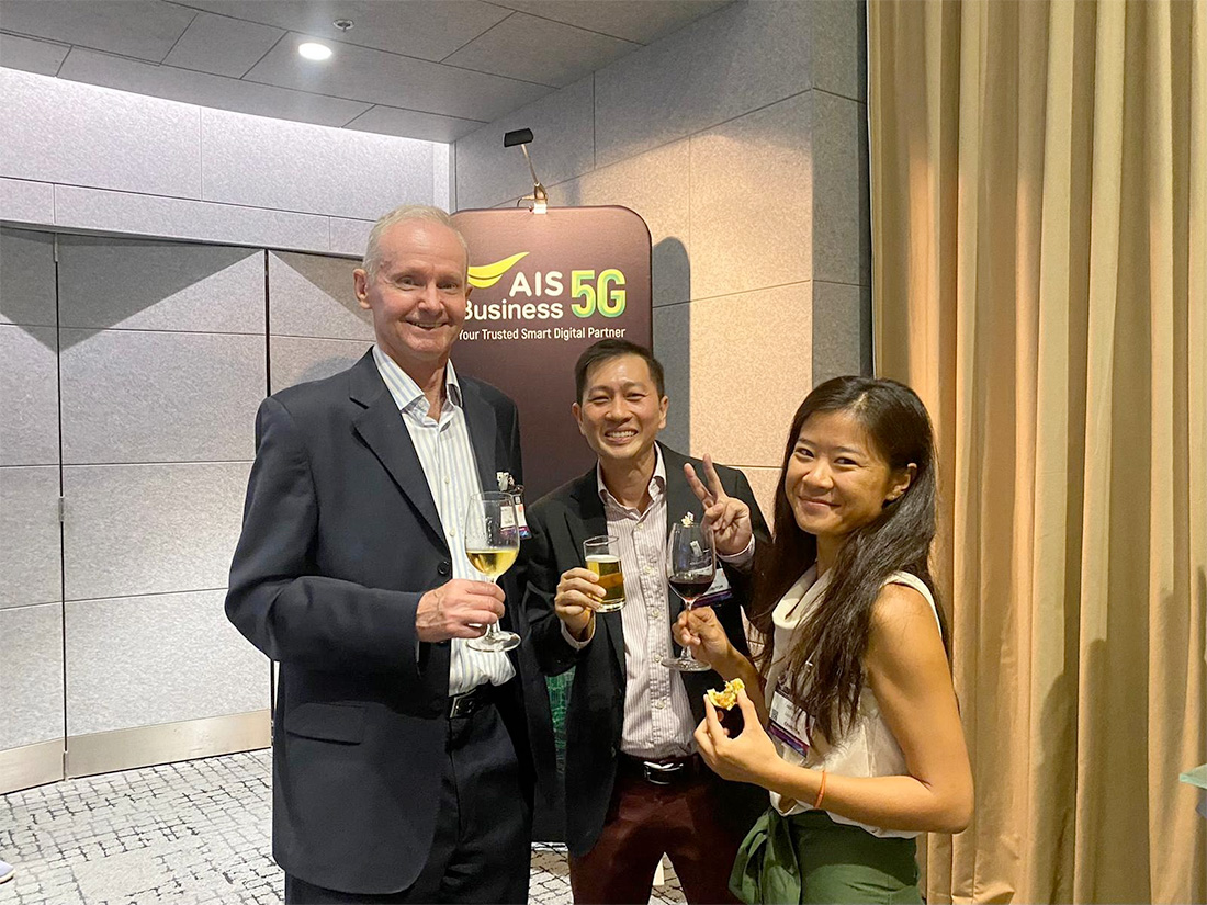'Say cheese'. Albeego’s Ian Kell and Graphcore’s Philip Tan and Abby Guo.